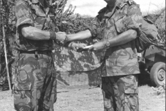 1986 Kenya CSgt Brook handing fun run proceeds to Padre